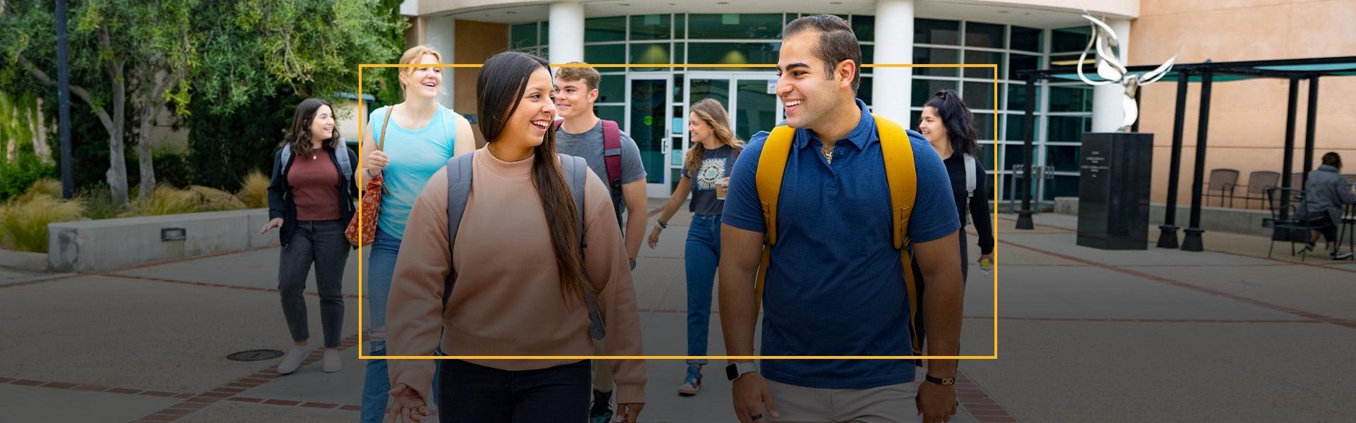 Concordia students walking outside the main building